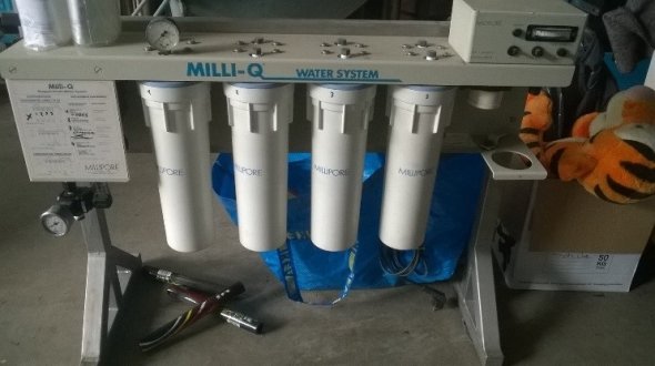 Milli-Q water treatment station including set of unused filter cartridges
